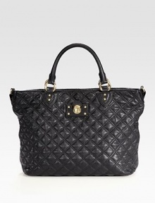 An incredibly roomy silhouette crafted from soft quilted leather, finished with a chunky chain and leather shoulder strap for a signature touch.Double top handles, 5 dropRemovable shoulder strap, 12½ dropTop zip closureOne inside open pocketLinen lining12½W X 11H X 4½DMade in Italy An incredibly roomy silhouette crafted from soft quilted leather, finished with a chunky chain and leather shoulder strap for a signature touch.Double top handles, 5 dropRemovable shoulder strap, 12½ dropTop zip closureOne inside open pocketLinen lining12½W X 11H X 4½DMade in Italy