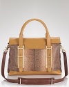 The satchel is the shape du jour, and Botkier's supple leather version is one to covet. A roomy silhouette is prime for daytime demands, while gold tone hardware lends cool.
