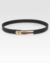 This classically modern design features supple nappa leather with a brass, logo engraved turn-lock closure. Width, about 1Imported 