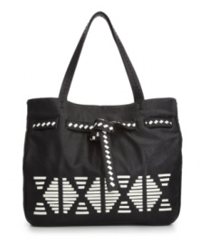An indie-chic design with tribal-inspired accents. This eye-catching tote from Danielle Nicole features whip stitch detailing, a belted top and a classic tote shape. An indie-chic design with tribal-inspired accents. This eye-catching tote from Danielle Nicole features whip stitch detailing, a belted top and a classic tote shape.