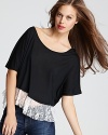 A flouncy lace hem adds charming femininity to this ultra-soft Sauce tee.