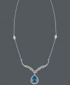 Your neckline has never looked so luxurious! B. Brilliant's beautiful teardrop-shaped pendant features a swirling design in white and London blue cubic zirconias (7-1/3 ct. t.w.). Set in sterling silver. Approximate length: 18 inches. Approximate drop: 1/2 inch.