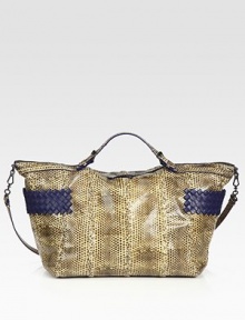 Gorgeous cobra pairs with ultra-soft woven lambskin leather in this slouchy top-handle design. Double adjustable top handles, 1½-3½ dropDetachable shoulder strap, 24 dropTop zip closureTwo outside open pocketsOne inside zip pocketOne inside open pocketSuede lining12¾W X 11H X 7½DMade in Italy Gorgeous cobra pairs with ultra-soft woven lambskin leather in this slouchy top-handle design. Double adjustable top handles, 1½-3½ dropDetachable shoulder strap, 24 dropTop zip closureTwo outside open pocketsOne inside zip pocketOne inside open pocketSuede lining12¾W X 11H X 7½DMade in Italy