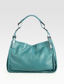 Vibrant leather in a slouched carryall edged with woven trim and snake-embossed straps.Adjustable shoulder straps, 7¼-10 dropMagnetic top closureOne inside zip pocketOne inside open pocketSuede lining10¼W X 10½H X 5DMade in Italy Vibrant leather in a slouched carryall edged with woven trim and snake-embossed straps.Adjustable shoulder straps, 7¼-10 dropMagnetic top closureOne inside zip pocketOne inside open pocketSuede lining10¼W X 10½H X 5DMade in Italy