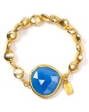 Coralia Leets' chalcedony stretch bracelet is a versatile eye-catcher. Set the vibrant gemstone against crisp white cotton for contemporary chic.