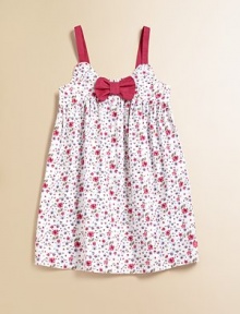 A little ladylike frock with a cheery floral print, empire waist and bow at the neckline. ScoopneckSleevelessPullover styleCottonMachine washImported
