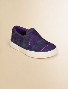 An adorable slip-on sneaker is rendered in durable preppy plaid canvas.Slip-on with elastic goreCanvas upperCotton canvas liningRubber solePadded insoleImported
