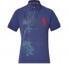 Stylish polo shirt in fine, medium blue pique cotton - A modern riff on a venerable classic from Ralph Lauren - Slim, straight cut - Small collar and short button placket - Oversize polo pony logo at chest and chic, multicolor graphic print - Hem hangs slightly longer in the back - Casually cool, ideal for everyday leisure - Pair with jeans, chinos or shorts