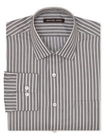 Fortify your workweek collection with this crisp Michael Kors dress shirt, delivering a classic fit and barrel cuffs in sleek stripes. Fortify your workweek collection with this crisp Michael Kors dress shirt, delivering a classic fit and barrel cuffs in sleek stripes.