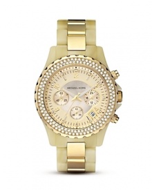 A gleaming gold tone bezel embellished with crystals offsets a mother of pearl dial in this luxe timepiece from MICHAEL Michael Kors.