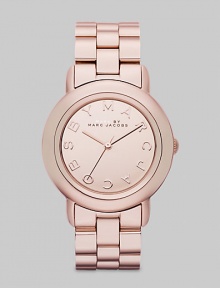 Smart and chic style with a mirror dial for added shine. Quartz movement Water resistant to 5 ATM Round rose gold ion-plated stainless steel case, 36mm (1.4) Rose gold mirror logo dial Second hand Rose gold ion-plated stainless steel link bracelet, 18mm wide (0.7) Imported 