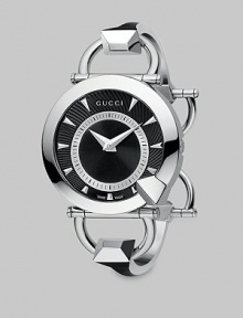 From the Chiodo Collection. This stylized timepiece has a beautiful black helical dial and a stainless steel bangle. Swiss quartz movementWater resistant to 3 ATMRound stainless steel case, 35mm (1.3) Smooth bezel with faceted detailBlack helical dial with markersStylized stainless steel bangleMade in Switzerland From the Chiodo Collection. This stylized timepiece has a beautiful black helical dial and a stainless steel bangle. Swiss quartz movementWater resistant to 3 ATMRound stainless steel case, 35mm (1.3) Smooth bezel with faceted detailBlack helical dial with markersStylized stainless steel bangleMade in Switzerland