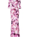 With its vivid dewy orchid print and radiant purple coloring, Roberto Cavallis maxi dress is an ultra romantic take on the iconic Cavalli look - Wrapped V-neckline, 3/4 sleeves, brooch detail at hip, pull-over style - Form-fitting - Wear with metallic pumps and a bright leather clutch