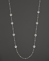 Faceted doublets of clear quartz and mother-of-pearl in sterling silver. By Ippolita.
