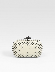 A gorgeous frame-top leather bag, finished with woven and stud details and a chic top knot clasp.Top clasp closureSuede lining7½W X 4¾H X 3/4DMade in Italy A gorgeous frame-top leather bag, finished with woven and stud details and a chic top knot clasp.Top clasp closureSuede lining7½W X 4¾H X 3/4DMade in Italy