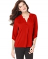 This petite top by NY Collection features a double-notched V-neckline and three-quarter sleeves with elastic cuffs-the perfect balance to a breezy silhouette. (Clearance)