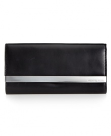 Simple, soft, and completely essential, this luxe leather wallet from MICHAEL Michael Kors stylishly stows all your everyday must-haves. The perfectly aligned interior provides plenty of pockets and compartments, while the exterior is accented with sleek silvertone detailing. Simple, soft, and completely essential, this luxe leather wallet from MICHAEL Michael Kors stylishly stows all your everyday must-haves. The perfectly aligned interior provides plenty of pockets and compartments, while the exterior is accented with sleek silvertone detailing.