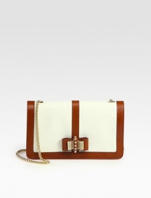 A lady-like silhouette of rich pebble-grain and matte calfskin, adorned with a demure chain-link bow.Chain shoulder strap, 20 dropMagnetic flap closureOne inside zip pocketOne inside compartment pocketFully lined11W X 7H X 1DMade in Italy A lady-like silhouette of rich pebble-grain and matte calfskin, adorned with a demure chain-link bow.Chain shoulder strap, 20 dropMagnetic flap closureOne inside zip pocketOne inside compartment pocketFully lined11W X 7H X 1DMade in Italy