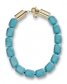 Tap into this season's turquoise jewelry trend with this chunky beaded necklace from MICHAEL Michael Kors, sure to enliven every neckline.