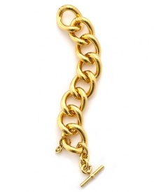 MICHAEL Michael Kors puts a modern spin on a jewelry box staple. Wear this chunky gold bracelet to add a golden finish to this season's jewel tones and opulent textures.