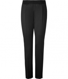 Jil Sanders black virgin wool pants are an artfully crafted example of elegant, precision tailoring - Medium-rise, slim cut style with a touch of stretch - Banded waist and side zip - Crease detail flatters and elongates the leg - Pant tapers and crops at ankles with a sleek vent - Polished and effortlessly chic, perfect for pairing with button downs or pullovers and ballet flats or pumps