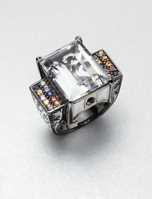 A beautiful Art Deco-inspired design with a center white topaz stone accented with multi-colored sapphire stones and glossy enamel set in an intricate rhodium-plated sterling silver shank. White topazMulti-colored sapphiresEnamelRhodium-plated sterling silverImported A beautiful Art Deco-inspired design with a center white topaz stone accented with multi-colored sapphire stones and glossy enamel set in an intricate rhodium-plated sterling silver shank. White topazMulti-colored sapphiresEnamelRhodium-plated sterling silverImported