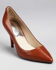 A classic shoe for the polished professional--MICHAEL Michael Kors introduces the supremely timeless MK Flex pump.