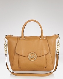 Daytime style gets polished with this sophisticated leather satchel from MICHAEL Michael Kors. In a versatile shape, this bag goes from work to weekends without a slip in style. Daytime style gets polished with this sophisticated leather satchel from MICHAEL Michael Kors. In a versatile shape, this bag goes from work to weekends without a slip in style.