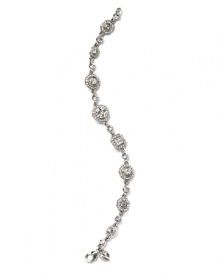 Your special occasion dress deserves an even more special bracelet. Here, from Carolee LUX, the geometric shaped crystal design makes your whole look sparkle.