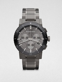 A technical timepiece in brushed and polished grey ion-plated stainless steel. Quartz movementWater resistant to 5 ATMRound grey ion-plated stainless steel case, 42mm (1.7)Decorative black ceramic bezelCheck stamped, gunmetal-finished chronograph dialBar hour markersDate display at 4 o'clockSecond hand Grey ion-plated stainless steel link braceletMade in Switzerland A technical timepiece in brushed and polished grey ion-plated stainless steel. Quartz movementWater resistant to 5 ATMRound grey ion-plated stainless steel case, 42mm (1.7)Decorative black ceramic bezelCheck stamped, gunmetal-finished chronograph dialBar hour markersDate display at 4 o'clockSecond hand Grey ion-plated stainless steel link braceletMade in Switzerland
