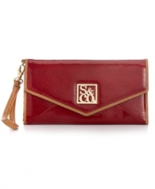 Stash all your staples in style with this sleek envelope silhouette from Style&co. that combined a wallet and clutch in one design. Shiny faux patent leather with custom hardware lend a luxe look, while the pocket-lined interior safely stows your valuables. Stash all your staples in style with this sleek envelope silhouette from Style&co. that combined a wallet and clutch in one design. Shiny faux patent leather with custom hardware lend a luxe look, while the pocket-lined interior safely stows your valuables.