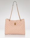 Luxe quilted leather with a lacquered finish meets gleaming hardware in this oh-so-chic shoulder bag from Marc Jacobs.