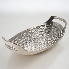 Precious metals and porcelain capture the timeless shifting of ocean, wind and sand into lasting impressions inspired by the dunes of Truro, Cape Cod. Precious metals and porcelain capture the timeless shifting of ocean, wind and sand into lasting impressions inspired by the dunes of Truro, Cape Cod.