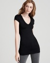 From Aqua: the essential v neck tee, body skimming, super soft and ideal for layering. You can never own just one...