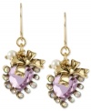 Crush-worthy earrings from Betsey Johnson. Featuring a pink-colored crystal heart outlined with small round-cut crystal accents, gold tone bow and small glass pearl. Crafted in antiqued gold tone mixed metal. Approximate drop: 1-1/2 inches.