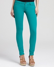 Sleek and chic, these Aqua jeans take you anywhere in slim perfection.