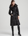 This tailored down coat with a long, slim silhouette features a fur-trimmed collar for luxe warmth.