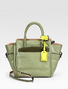 Smooth burnished glovetan leather in a tailored top-handle carryall. Double top handles, 4¼ dropRemovable, adjustable shoulder strap, 21-22½ dropFront pocket with removable zip pouchBack slide pocketProtective leather feetTwo inside zip pocketsInner zip pouchCotton lining9¾W X 9½H X 4¾DImported Smooth burnished glovetan leather in a tailored top-handle carryall. Double top handles, 4¼ dropRemovable, adjustable shoulder strap, 21-22½ dropFront pocket with removable zip pouchBack slide pocketProtective leather feetTwo inside zip pocketsInner zip pouchCotton lining9¾W X 9½H X 4¾DImported