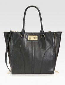 Sumptuous matte leather in a roomy carryall finished with polished hardware and expandable zip gusset.Double top handles, 10½ dropRemovable shoulders strap, 19 dropTurnlock closureOne outside open pocketOne inside zip pocketTwo inside open pocketsFully lined13W X 13½H X 3DImported Sumptuous matte leather in a roomy carryall finished with polished hardware and expandable zip gusset.Double top handles, 10½ dropRemovable shoulders strap, 19 dropTurnlock closureOne outside open pocketOne inside zip pocketTwo inside open pocketsFully lined13W X 13½H X 3DImported