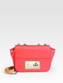 Sumptuous vachetta leather in a demure turnlock flap silhouette, topped with a polished chain and leather shoulder strap.Chain and leather shoulder strap, 12-23 dropTurnlock flap closureOne outside open pocketOne inside zip pocketOne inside open pocketFaille lining7¼W X 5¼H X 1¾DImported Sumptuous vachetta leather in a demure turnlock flap silhouette, topped with a polished chain and leather shoulder strap.Chain and leather shoulder strap, 12-23 dropTurnlock flap closureOne outside open pocketOne inside zip pocketOne inside open pocketFaille lining7¼W X 5¼H X 1¾DImported