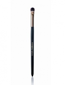 EXCLUSIVELY AT SAKS. A slim stem with natural bristles gathered at the base, tapering slightly at the tip. Perfect for sweeping a single shade from brow to lid or for blending two or more shades with ease. 