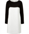 Modern in monochrome with cool long sleeves, Tibis black and white silk shift is a chic choice for dressing up day and evening looks alike - Wide neckline, long sleeves, hidden zippered cuffs, hidden back zip - Loosely tailored fit - Wear with jet black leather accessories and statement chunky chain jewelry