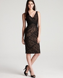 In asymmetric paneled lace, this ML Monique Lhuillier dress lends timeless glamour.