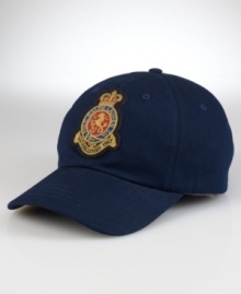A classic baseball cap in durable washed cotton twill features a signature embroidered crown-and-crest patch for authentic naval styling. A classic baseball cap in durable washed cotton twill features a signature embroidered crown-and-crest patch for authentic naval styling.