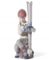 This little girl is taking a break from a day at the slopes as she sits with her skis and a small bird perched upon her hand. Handcrafted from Lladro.