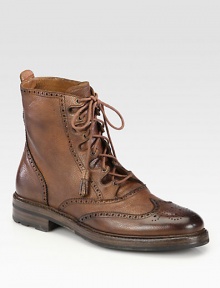 Distressed, country grain leather wingtip boot with perforated detailing for a heritage-inspired feel.Leather upperLeather liningPadded insoleRubber soleImportedOUR FIT MODEL RECOMMENDS ordering true size. Distressed, country grain leather wingtip boot with perforated detailing for a heritage-inspired feel.Leather upperLeather liningPadded insoleRubber soleImportedOUR FIT MODEL RECOMMENDS ordering true size.