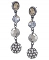 Long story. Four different versions of glass beads add a chic, complex element to these lovely linear drop earrings from Carolee. Crafted in hematite tone mixed metal, they'll look equally stylish for day or evening. Approximate drop: 2-1/4 inches.