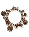 Carolee's glittering chain-link bracelet draws inspiration from the natural colors and textures of fall. Wear the autumnal accent to make wardrobe staples feel seasonal.