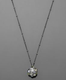 Little accessories can make a big impact. This Fossil fireball pendant features multicolored crystal accents set in silvertone mixed metal. Approximate length: 16 inches + 2-inch extender. Approximate drop: 1/2 inch.