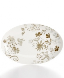 A muted palette tones down the busy florals that adorn this Song Meadow platter that, in dishwasher- and microwave-safe porcelain, will make busy cooks sing. Complements Martha Stewart Collection dinnerware. A muted palette tones down the busy florals that adorn this Song Meadow platter that, in dishwasher- and microwave-safe porcelain, will make busy cooks sing. Complements Martha Stewart Collection dinnerware.
